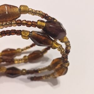 Amber coloured beaded memory wire bracelet